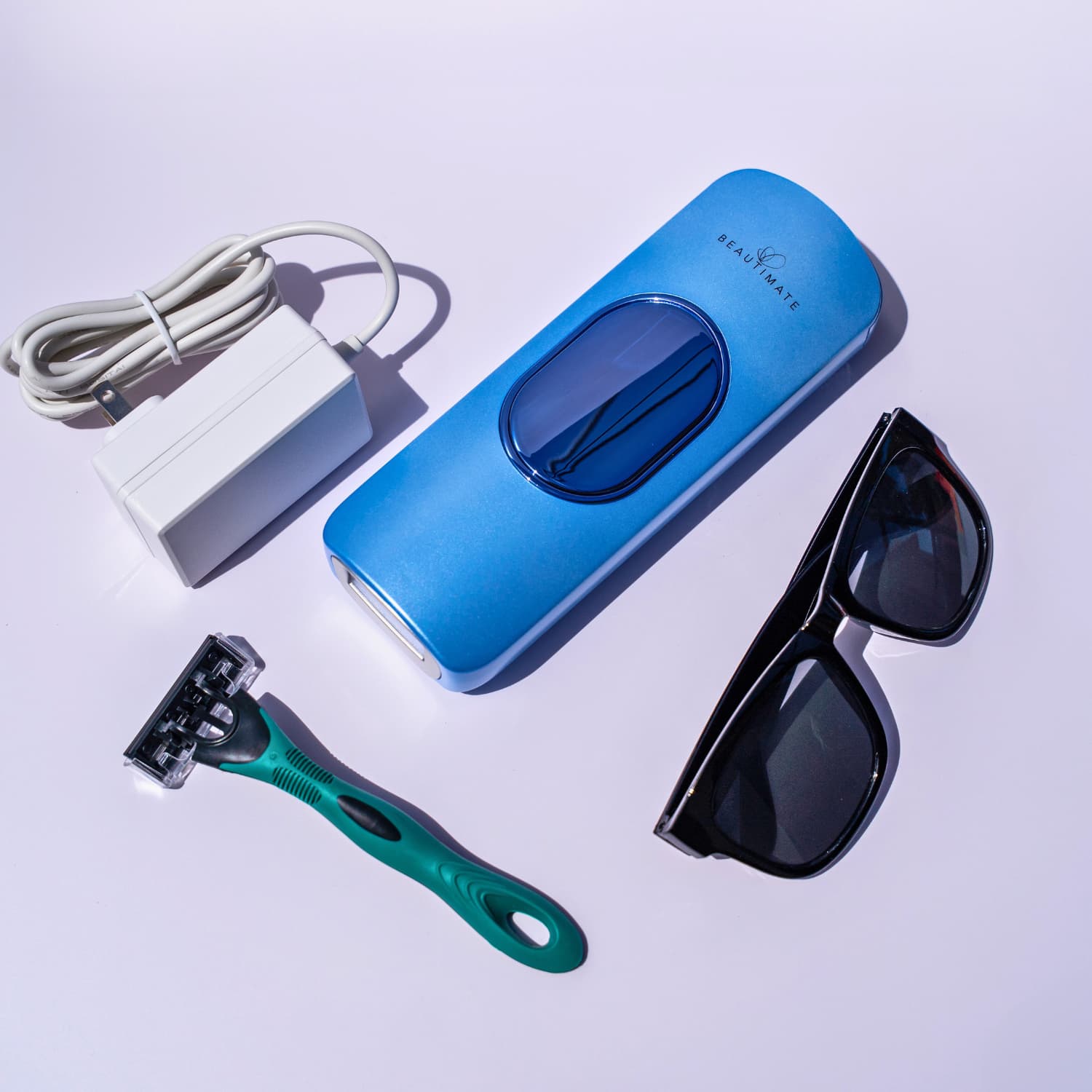 Beautimate IPL Hair Removal Kit – includes SL-B329 device, razor, adapter, goggles, and instructions