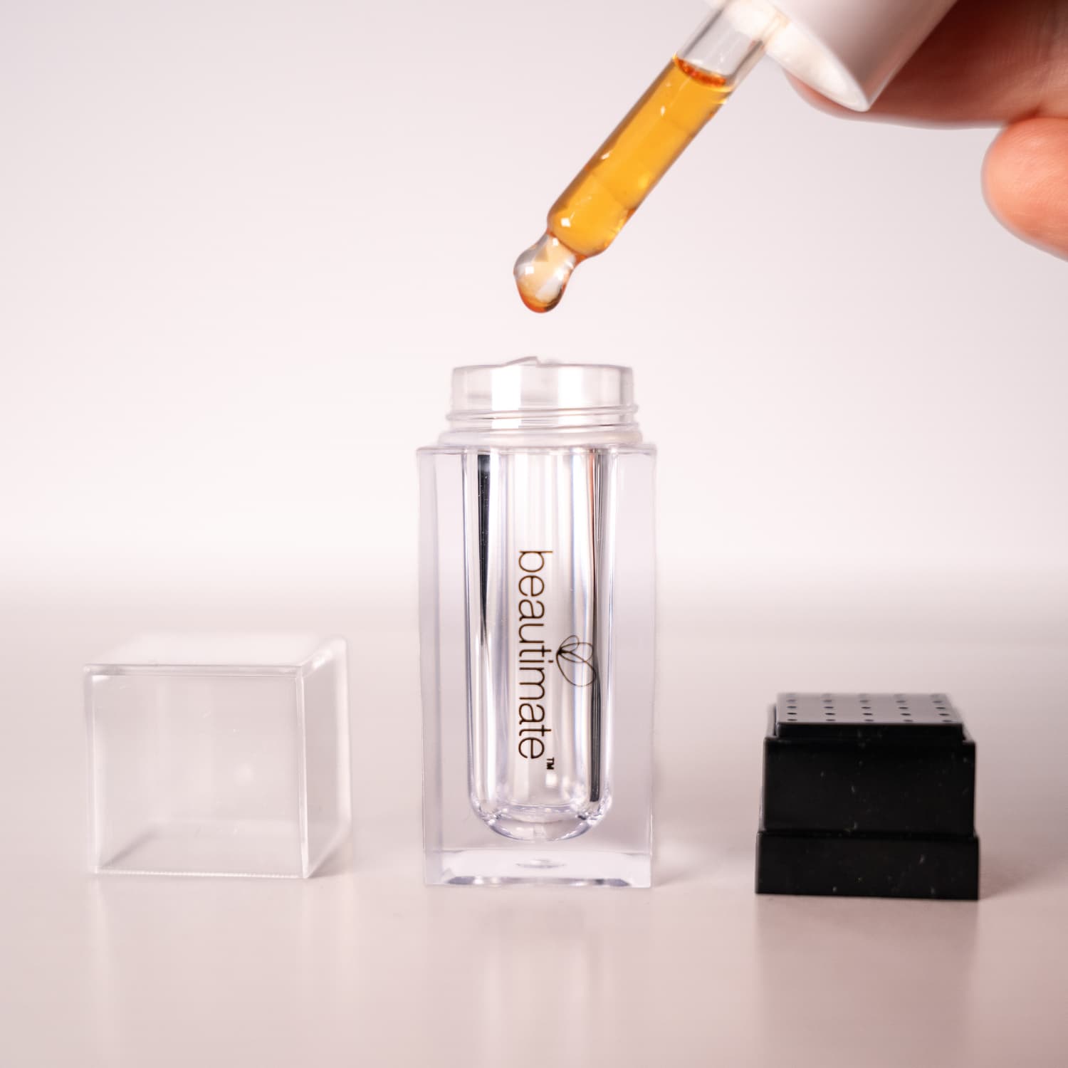 Beautimate Hydra Stamp opened to show refillable chamber and needle head components